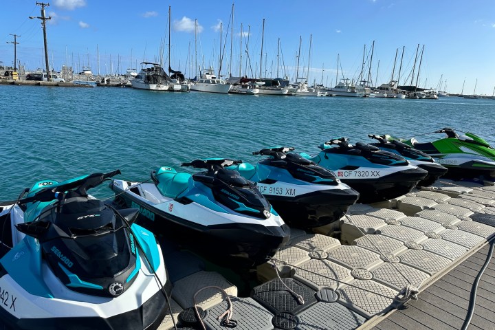 a boat parked next to a body of water